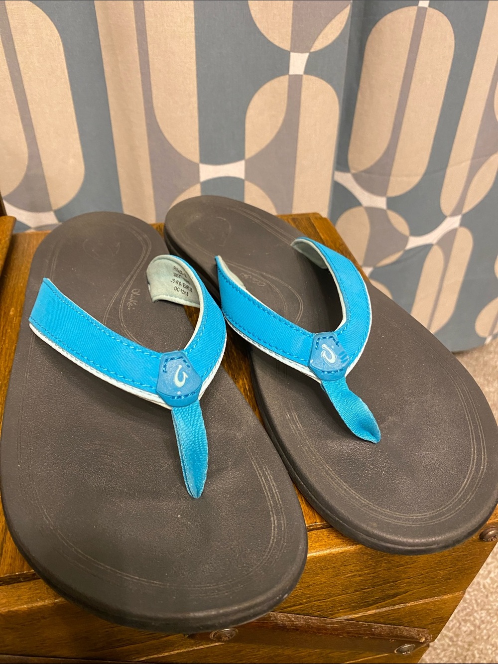 OluKai Turquoise Thong Sandals with Black Footbed